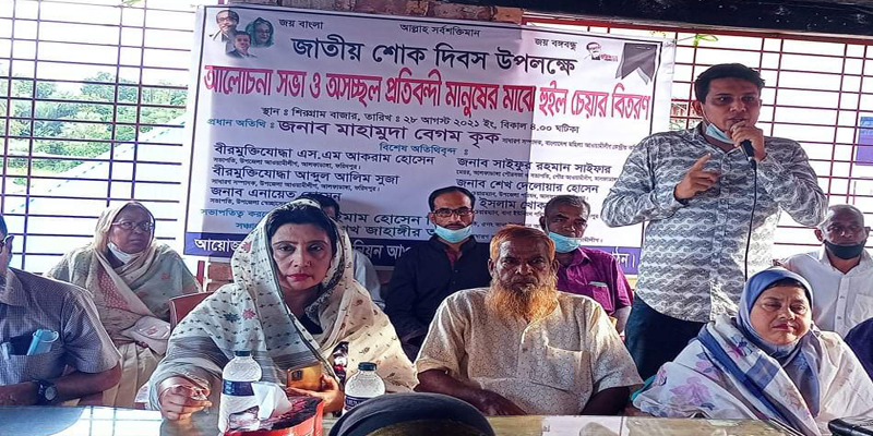 আলফাডাঙ্গায় অসচ্ছল প্রতিবন্ধী মানুষের মাঝে হুইল চেয়ার বিতরণ
