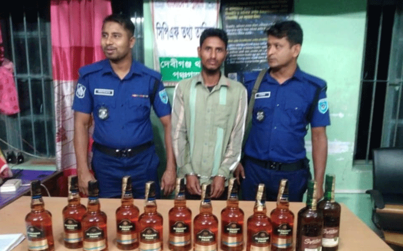দেবীগঞ্জে ১২ বোতল বিদেশী মদসহ মাদক ব্যবসায়ী গ্রেফতার